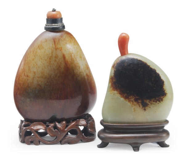 A CHINESE RUSSET AND YELLOW JADE AND A GREEN AND RED SOAPSTONE SNUFF BOTTLE,**