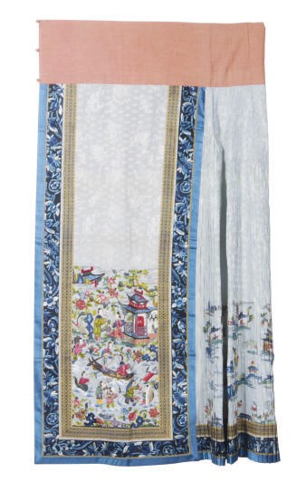 A CHINESE EMBROIDERED SILK PALE BLUE GROUND PLEATED SKIRT AND A RED GROUND SKIRT,