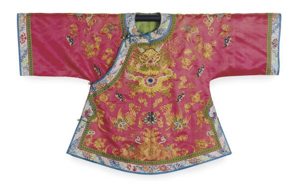 A CHINESE EMBROIDERED SILK RED GROUND SHORT JACKET WITH GOLD THREADS, DRAGONS, AND PHOENIXES,