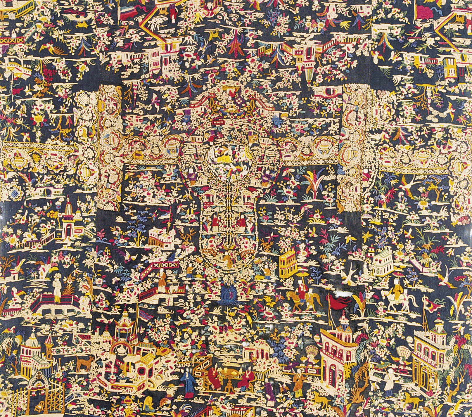 A CHINESE EMBROIDERED SILK DARK BLUE GROUND PANEL,