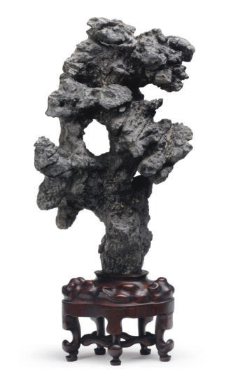 A CHINESE SCHOLAR'S ROCK ON WOOD STAND