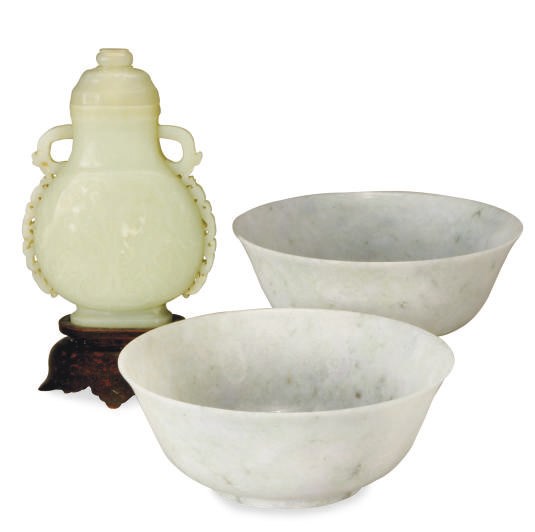 A PAIR OF CHINESE LAVENDER JADEITE BOWLS AND A WHITE JADE FLATTENED PEAR-FORM VASE AND COVER,