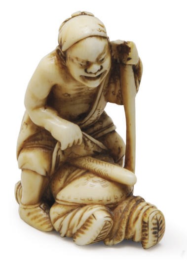 A JAPANESE IVORY HUMEROUS NETSUKE,**