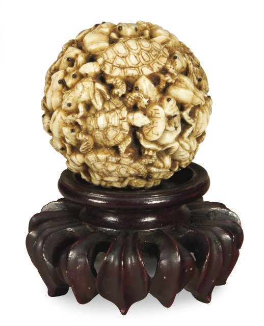 A JAPANESE IVORY CARVED TABLE ORNAMENT WITH TURTLES AND FROGS,**