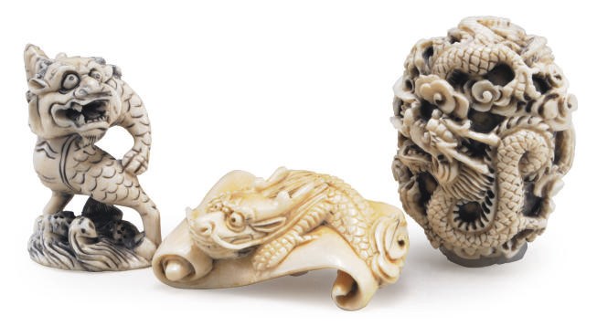 A GROUP OF THREE JAPANESE IVORY NETSUKE,**