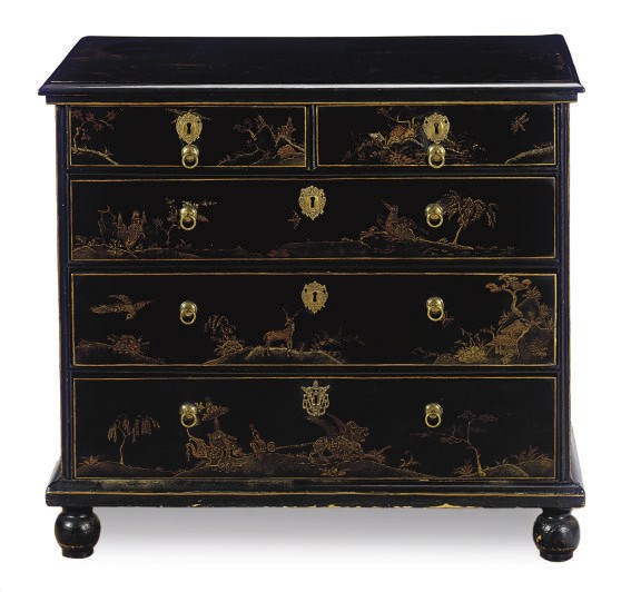 A BLACK AND GILT-JAPANNED CHEST-OF-DRAWERS,