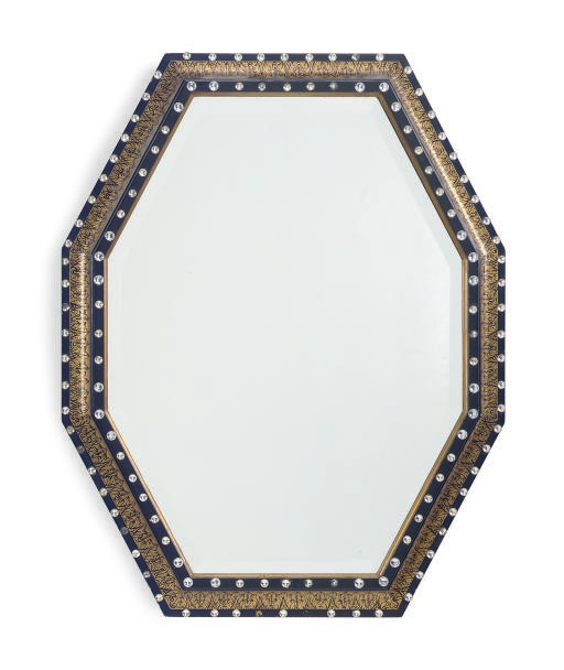 AN EBONIZED AND PARCEL-GILT OCTAGONAL MIRROR,