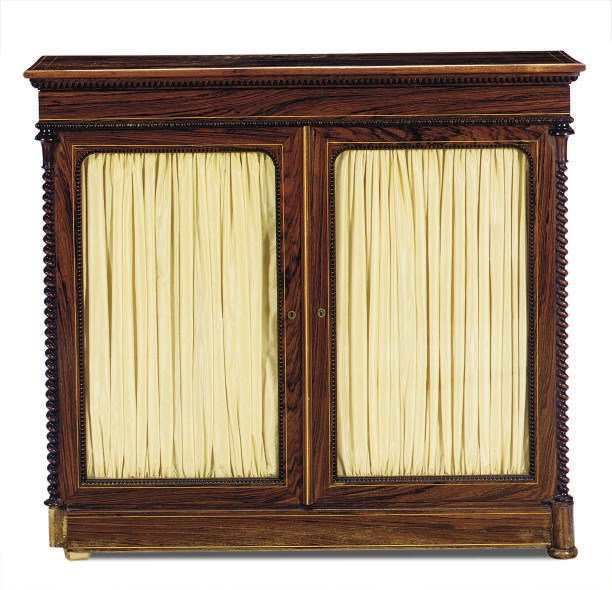 A LOUIS PHILIPPE ROSEWOOD AND LINE-INLAID SIDE CABINET**,