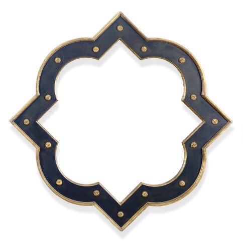 AN EBONIZED AND PARCEL-GILT MIRROR,