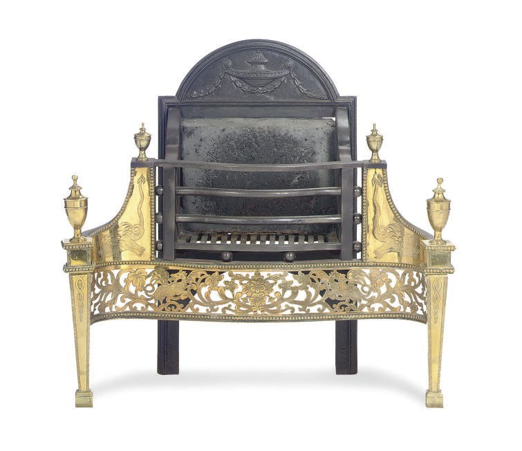 A BRASS AND STEEL FIRE BASKET,