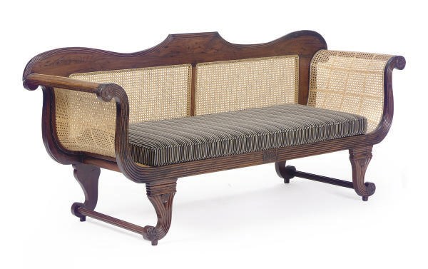 AN ANGLO-INDIAN HARDWOOD AND ROSEWOOD CANED SOFA**,