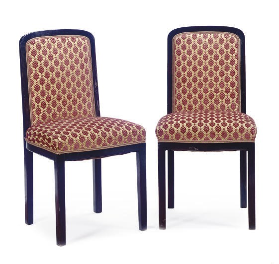 A SET OF SIX EBONIZED AND UPHOLSTERED SIDE CHAIRS,