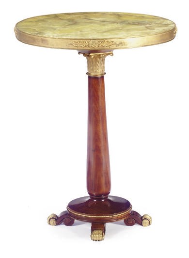 A GILT-METAL MOUNTED MAHOGANY AND ONYX GUERIDON,