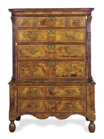 A GEORGE II WALNUT AND FEATHERBANDED CHEST-ON-STAND,