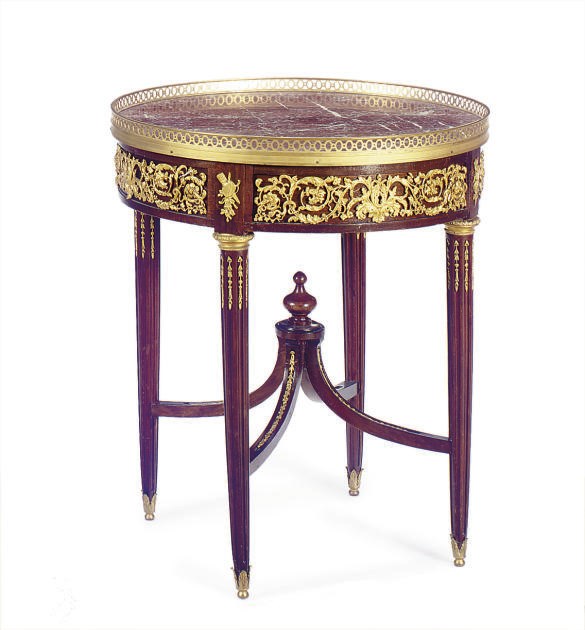 A FRENCH ORMOLU-MOUNTED MAHOGANY GUERIDON,