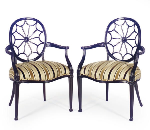 AN ENGLISH SET OF FOUR STAINED MAHOGANY WHEELBACK OPEN ARMCHAIRS,