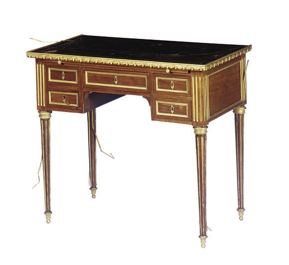 A FRENCH ORMOLU-MOUNTED AND BRASS-INLAID MAHOGANY WRITING TABLE,