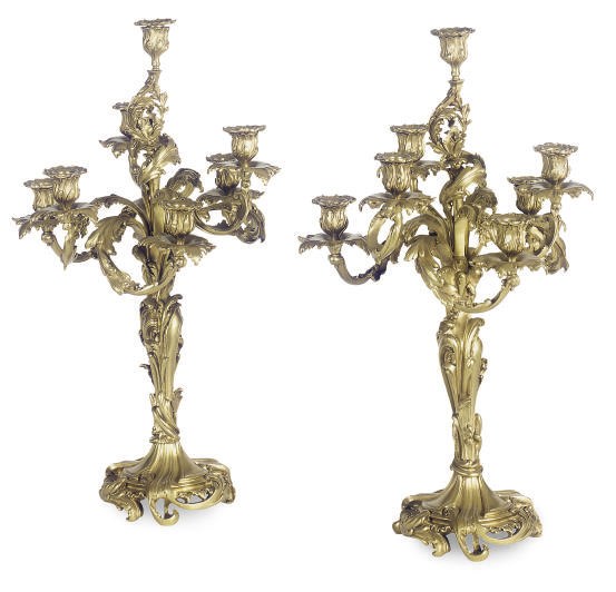 A PAIR OF GILT-BRONZE SEVEN-LIGHT CANDELABRA,