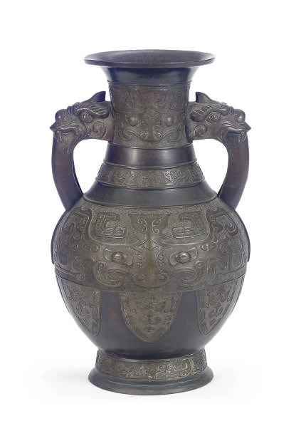 A JAPANESE BRONZE TWIN-HANDLED VASE,