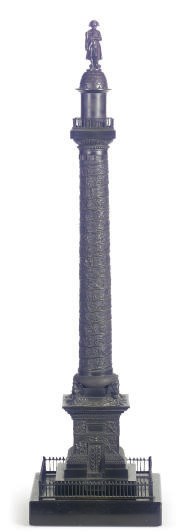 A PATINATED BRONZE COLUMN,