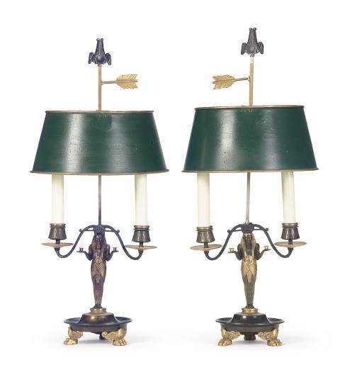 A PAIR OF PATINATED AND GILT-BRONZE TWO-LIGHT CANDELABRA,