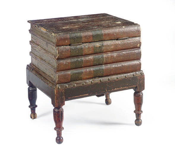 A CONTINENTAL PAPIER MACHE TROMP L'OEIL CUPBOARD,