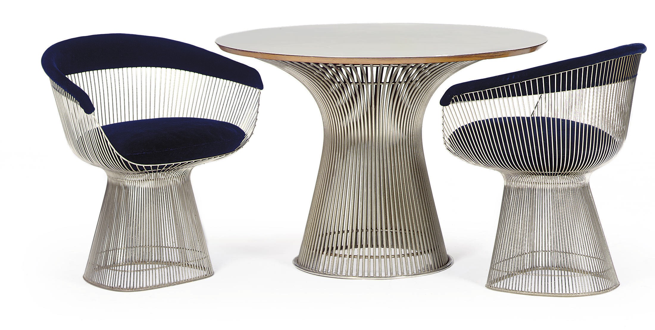 A DINING TABLE AND CHAIRS,