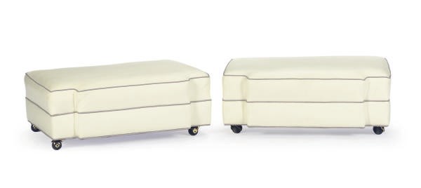 A PAIR OF WHITE-LEATHER UPHOLSTERED HASSOCKS,