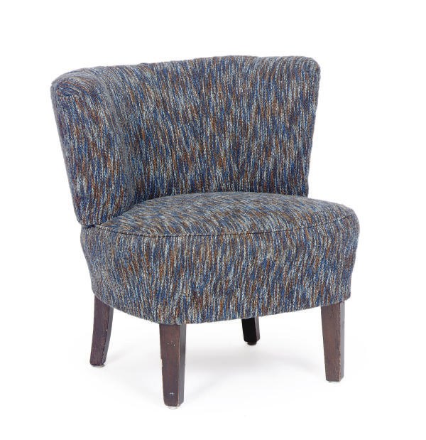 AN EBONIZED AND UPHOLSTERED LOW CHAIR,