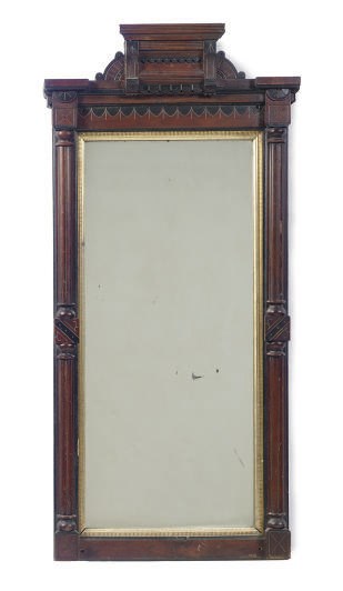 A WALNUT, PART-EBONIZED AND PARCEL-GILT MIRROR,