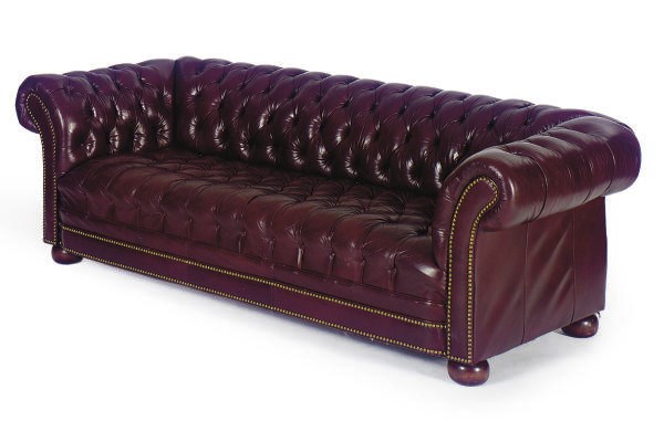 A BURGUNDY-LEATHER BUTTON-TUFFTED UPHOLSTERED CHESTERFIELD SOFA,