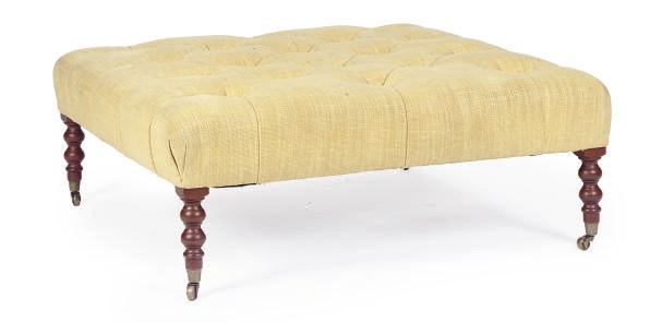 A YELLOW VELOUR BUTTON-TUFTED OTTOMAN,