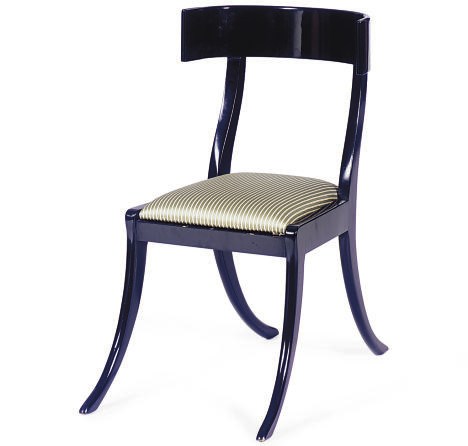 AN EBONIZED AND UPHOLSTERED SIDE CHAIR,