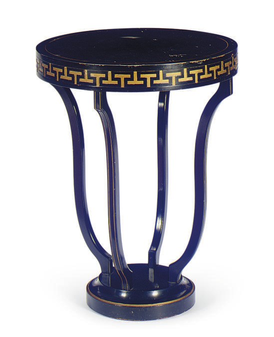 AN EBONIZED AND PARCEL-GILT SIDE TABLE,