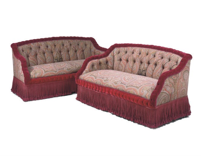 A PAIR OF PAISLEY PRINT AND RED VELVET SMALL SOFAS,