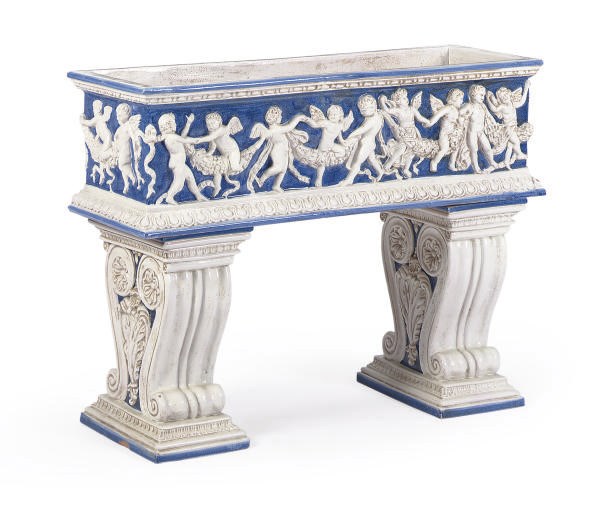 A WHITE AND BLUE GLAZED TERRACOTTA PLANTER,