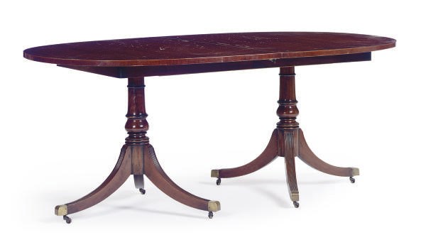 A MAHOGANY DOUBLE-PEDESTAL DINING TABLE,