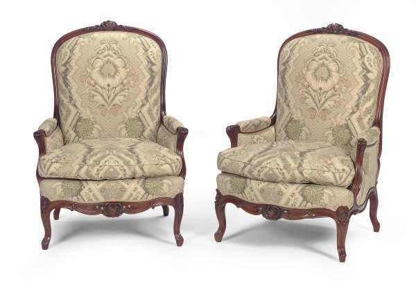 A PAIR OF WALNUT AND UPHOLSTERED BERGERES,
