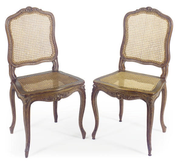 A SET OF FOUR OAK AND CANED DINING CHAIRS,
