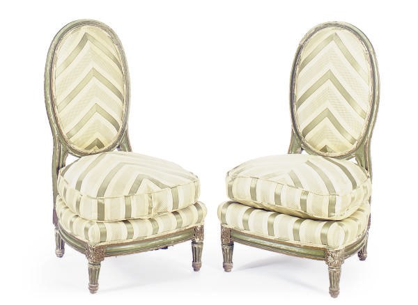 A PAIR OF GREEN-PAINTED, PARCEL-GILT AND UPHOLSTERED LOW CHAIRS,