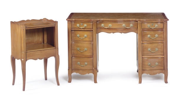 A FRUITWOOD SERPENTINE WRITING DESK,