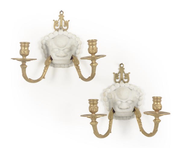 A PAIR OF GILT-BRONZE AND BISQUE PORCELAIN TWO-BRANCH WALL LIGHTS,