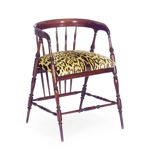 A MAHOGANY SPINDLE-BACK LOW ARMCHAIR,