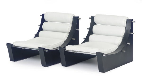 A PAIR OF ITALIAN CHROMED-METAL, EBONIZED AND WHITE-LEATHER UPHOLSTERED LOUNGE CHAIRS,