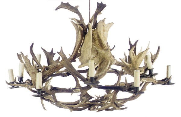 A METAL-MOUNTED ANTLER EIGHT-LIGHT CHANDELIER,