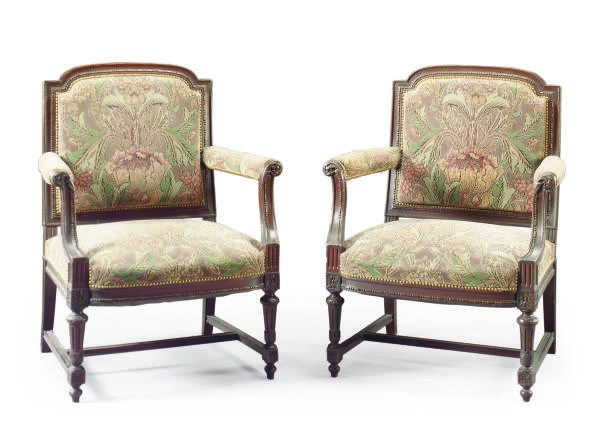 A PAIR OF MASSIVE CARVED OAK RENAISSANCE REVIVAL OPEN ARMCHAIRS,