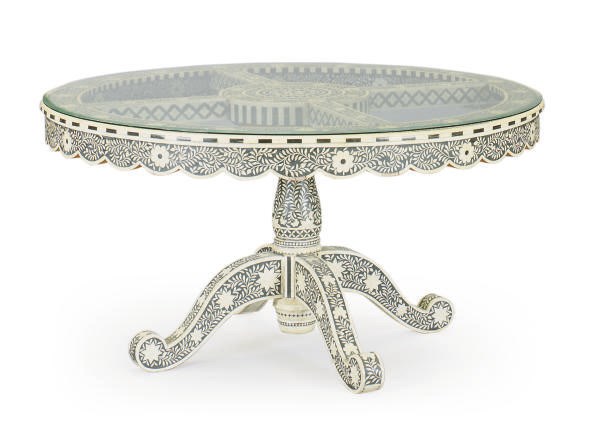 AN EASTERN EBONIZED WOOD AND BONE INLAID CENTER TABLE WITH GLASS TOP,