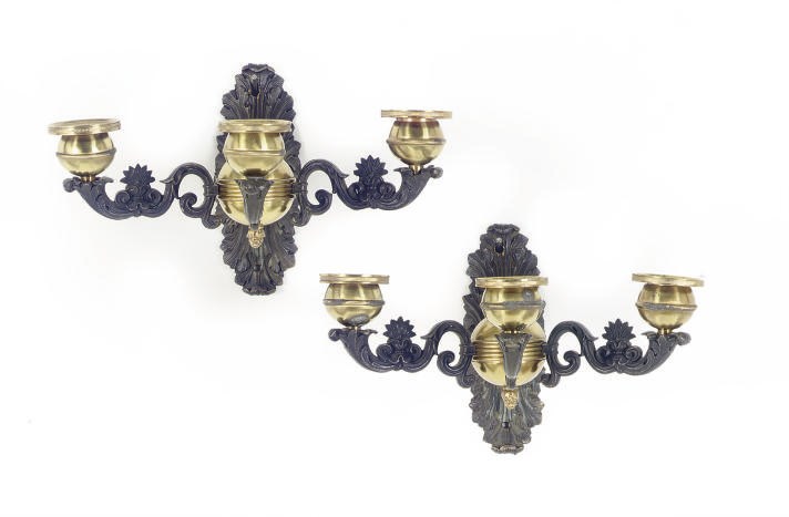 A PAIR OF PATINATED AND GILT BRONZE THREE-BRANCH WALL LIGHTS,
