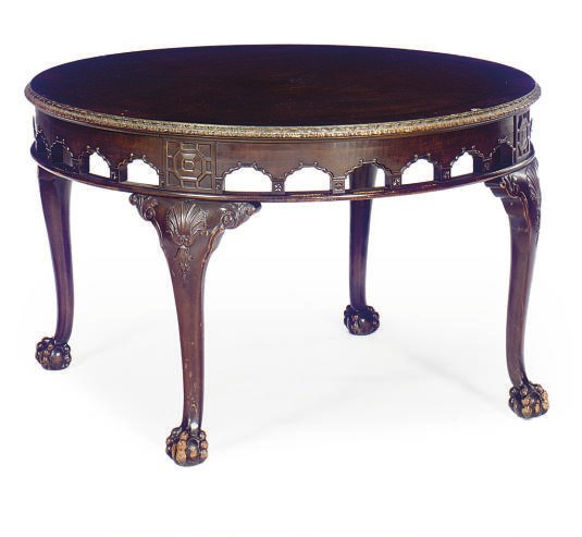 A STAINED WOOD CENTER TABLE,