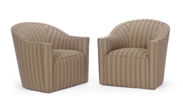 A SET OF FOUR UPHOLSTERED SWIVEL CLUB CHAIRS,